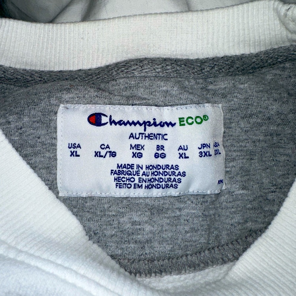 this is a champion crew neck white, heavy material, very comfortable